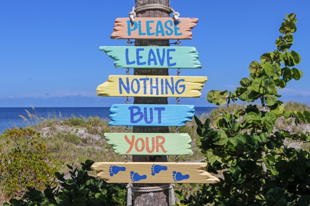 image of a colorful signboard on a beach somewhere